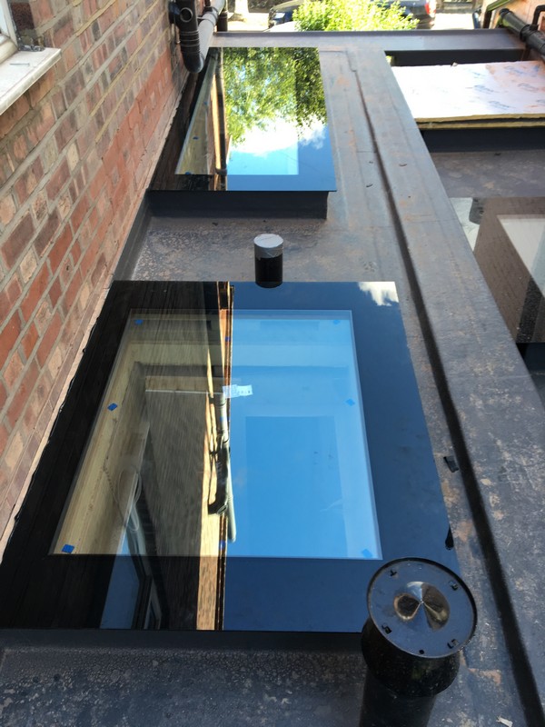 Multiple flat roof skylights on extension in Isleworth